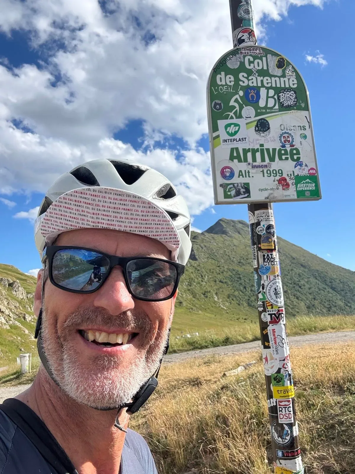 Summit shot at Col de Sarenne — 1999 m, stickers and all