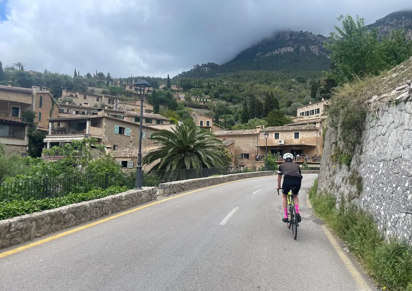 Grand traverse cycling Mallorca — winding mountain roads above the coastline