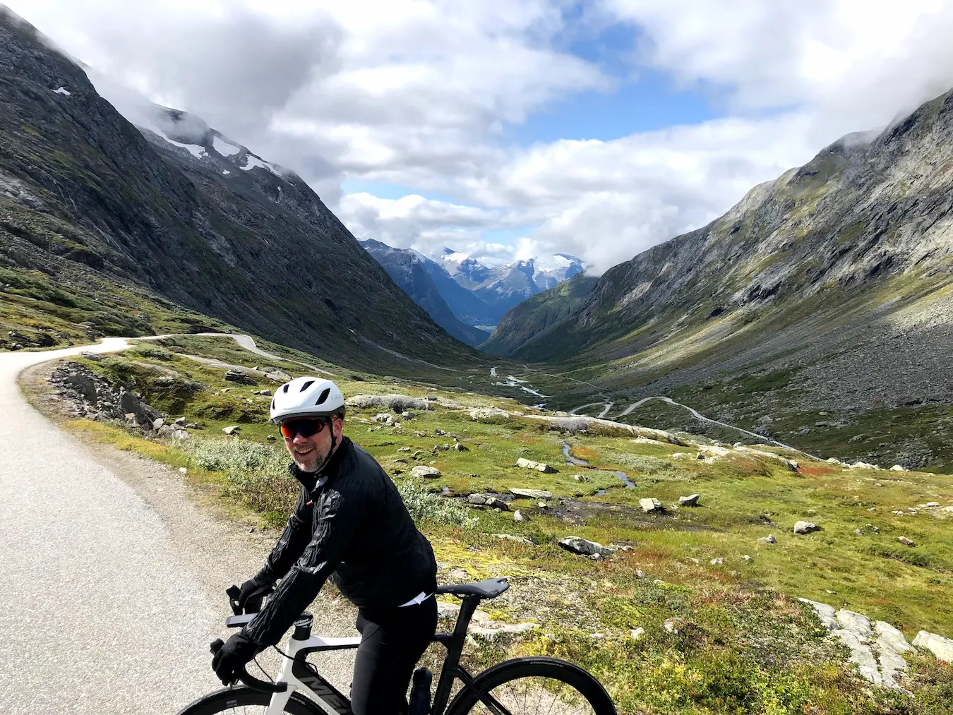 Gamle Strynefjellsveg, Norway — old mountain road built 1881-1894 with snow-flecked peaks above