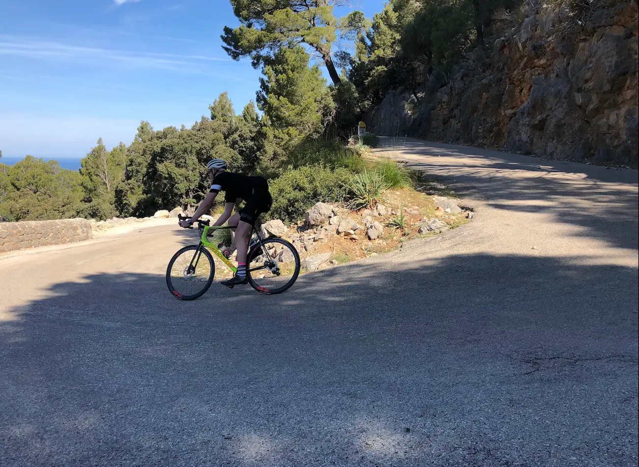 Cycling near Valldemossa, Mallorca — steep coastal descent on the Palma to Galilea route