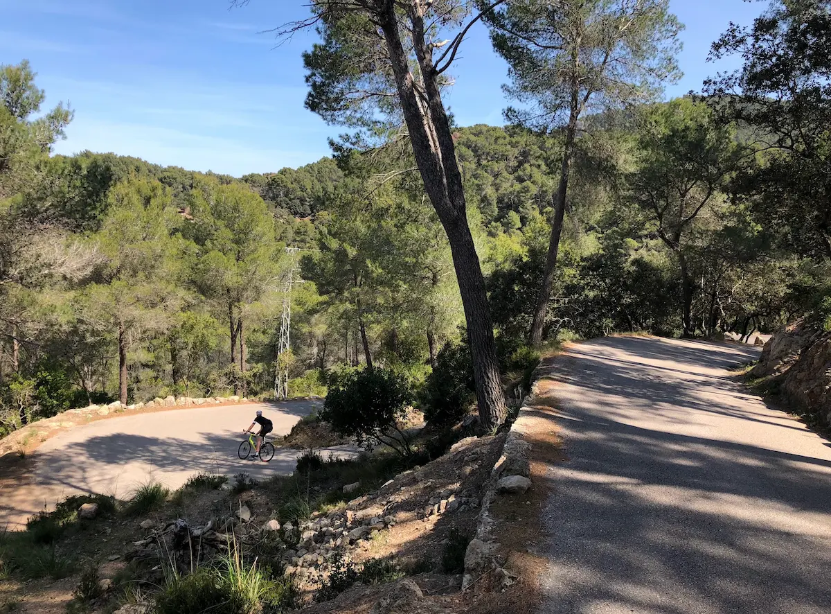 Cycling to Port des Canonge, Mallorca — quiet switchback descent to the Mediterranean