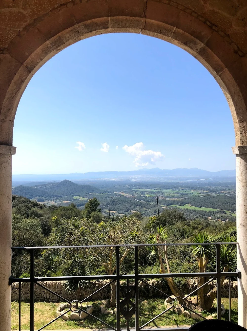 Panoramic view over Mallorca from Santuari de Cura monastery arch — 360-degree views from the Randa climb