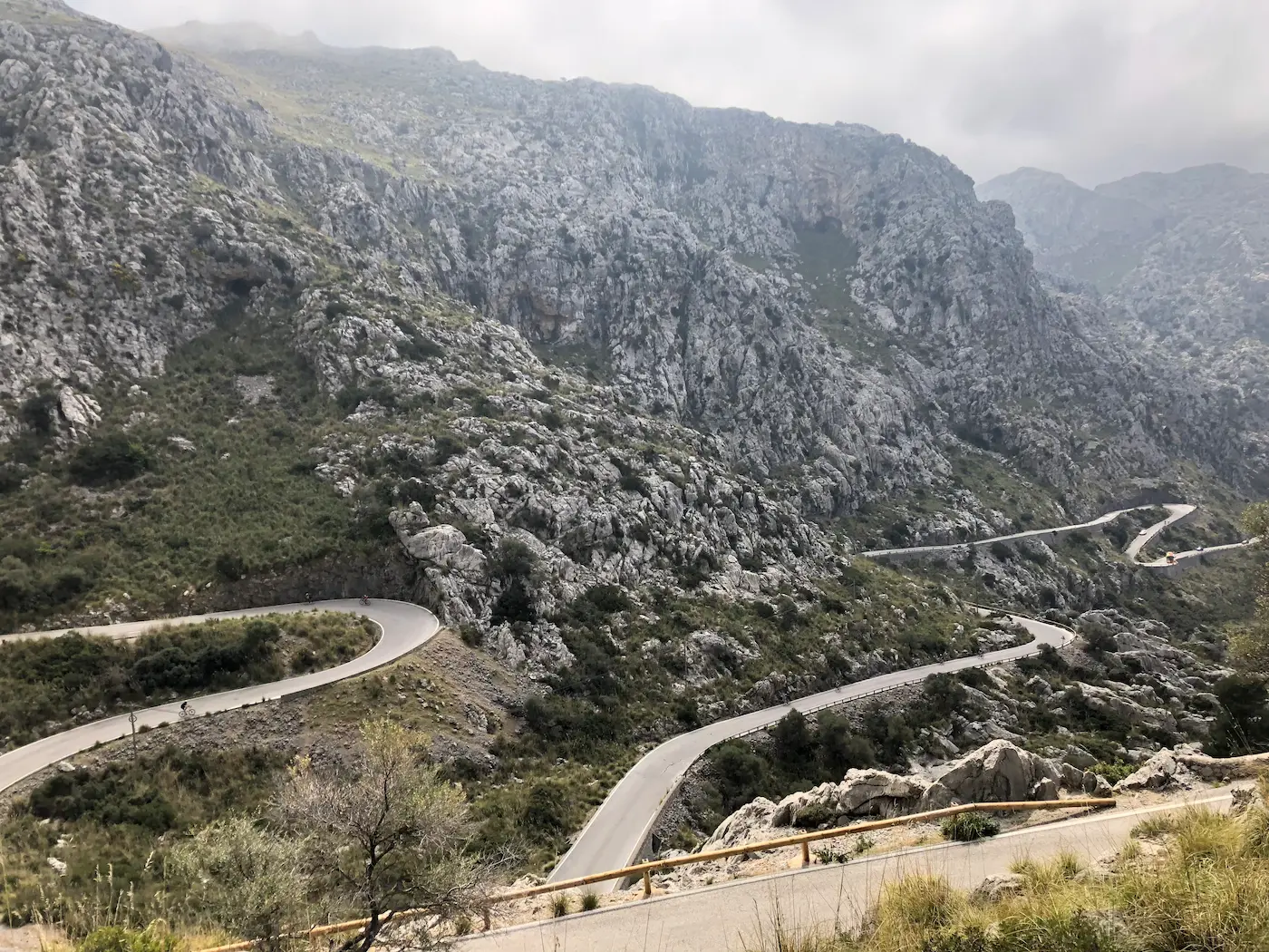 Cyclist on Sa Calobra hairpin bends, the queen stage climb from sea level on Mallorca's Tramuntana coast.
