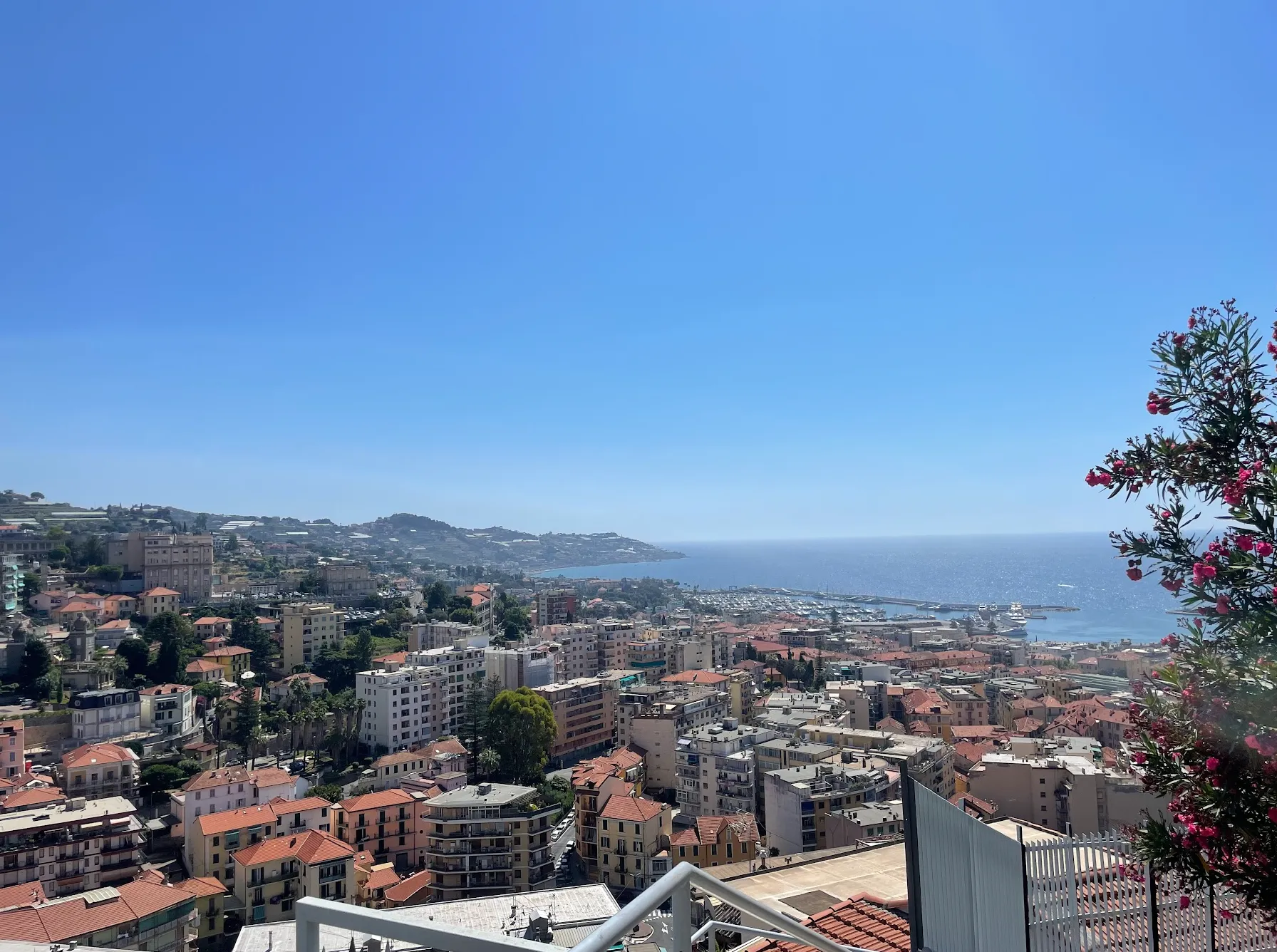 Descent toward San Remo — sweeping views over the Italian Riviera on the Salita dei Vignai loop
