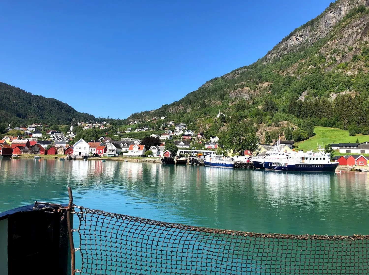 Cycling ferry on Sognefjord, Norway — crossing between Urnes and Solvorn with mountain views
