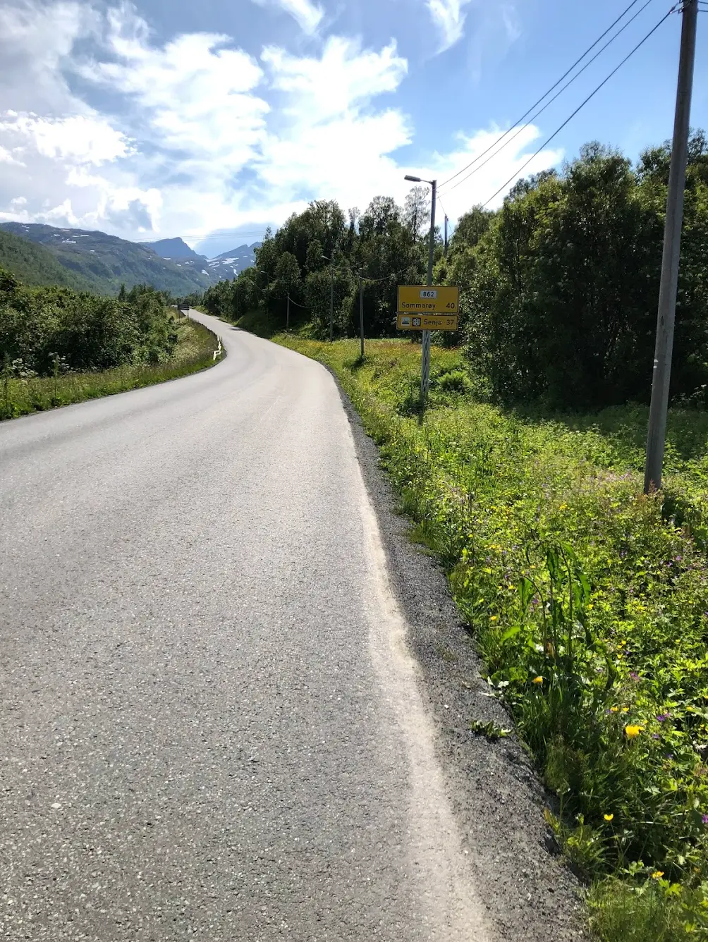 Midnight sun cycling near Tromsø — the Kvaløysletta loop above the Arctic Circle